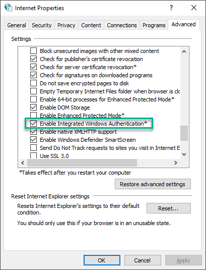 The Internet Properties dialog box, showing the advanced tab with the Enable Integrated Windows Authentication setting check box selected.